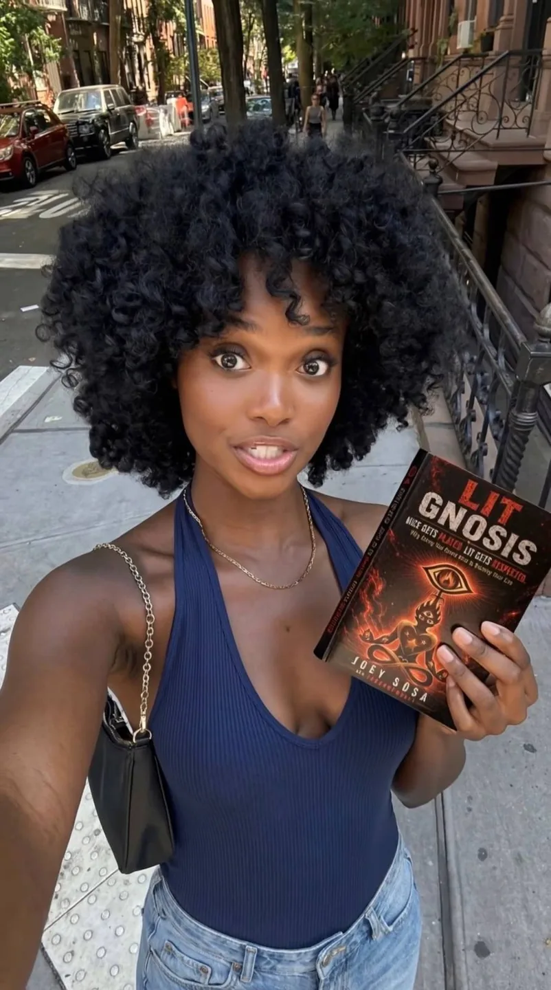 Lit Gnosis supporter with a Lit Gnosis book