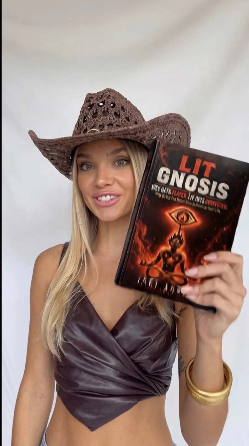 Lit Gnosis supporter with a Lit Gnosis book